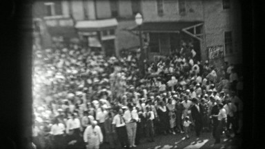 1938: Symbolic Parade Marching Statue Down Middle of Street