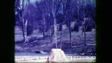 1938: Island Spouter Geyser Park natural water formation erupting. SARATOGA
