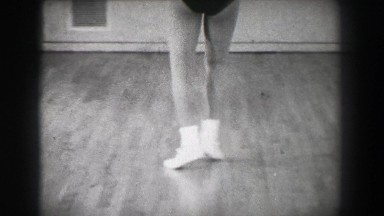 1966: Jazz dance moves 5 closeup behind kick stepping shuffle slide. NEW YORK
