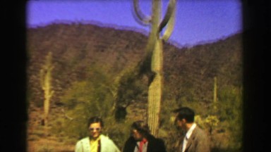 1951: Tall Old Cactus Family Grudgingly Posing on Road Trip Vacation in Ajo, Arizona
