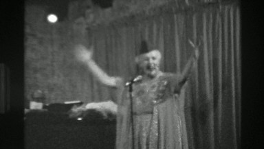1944: Vaudeville Senior Woman Performing Singing Act on Stage