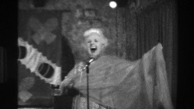 1944: Cheesy Vaudeville Senior Woman Entertaining Performer Singing Musician