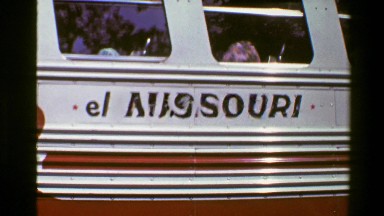 1976: El Missouri red Mercedes Benz tour school bus. SAN JOSE, COSTA RICA