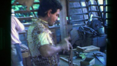 1976: Industrial workshop man in Hawaiian shirt hammering shop class. SAN JOSE,