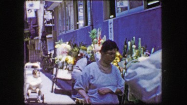 1944: Asian flower market street carts selling business outdoor florist.