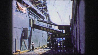 1944: US Army Victory Celebration with Ribbon and Streamer at Ship Loading Ramp