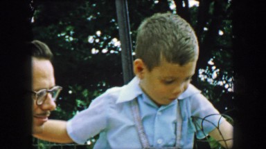 1957: Debonair father son laughing at outdoor recreational area. GLEN, NEW