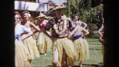 1958: Solo Man Closeup Taking Hawaiian Hula Dance Lessons on Hotel Resort