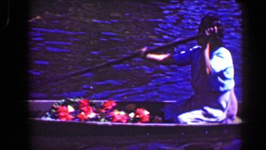 1951: Widowed Woman Selling Flowers from River Boat in Chisec, Guatemala