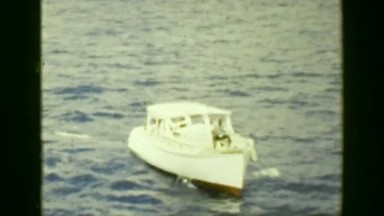 1953: Boating Emergency Rescue Mission Captain Climbs Aboard Cruise Ship.