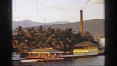 1953: Tropical industrial banana republic ocean harbor Caribbean seaport.