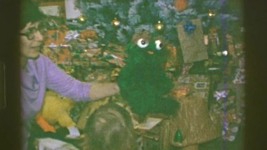 1961: vintage video young girls receiving their christmas presents IOWA