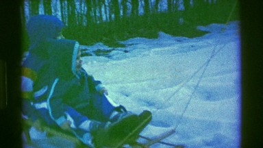1961: dudes glide on ice. IOWA