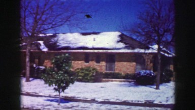 1961: snowy street and a pretty house IOWA