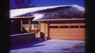 1961: a garage is seen covered in snow IOWA