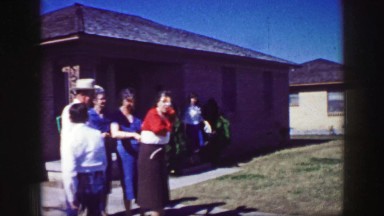 1961: a family is seen waiting IOWA