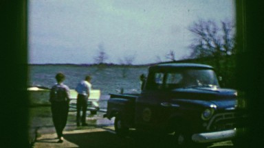 1961: friends put boat into water IOWA