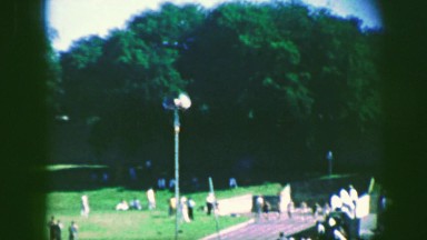 1961: Runners Sprinting on Track in Iowa High School Race