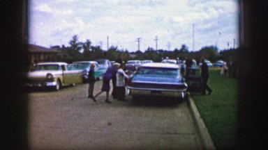 1961: a family is seen entering a car IOWA