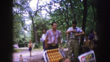1961: a picnic in a forest area is seen IOWA