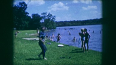 1961: a beautiful day out with family and neighbors at the beach catching some