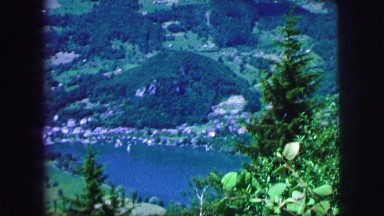 1963: a beautiful natural village and its houses near hills and lake FRANCE