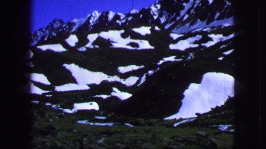1963: traveling along a road with mountains in the distance FRANCE
