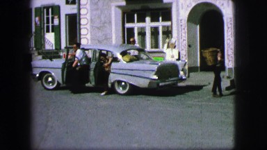 1963: peacock bird free roaming zoo grounds showing plumage near food court