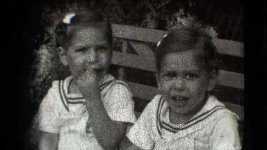1942: Twin Girls in Sailor Suits on Bench, Cottonwood, Arizona