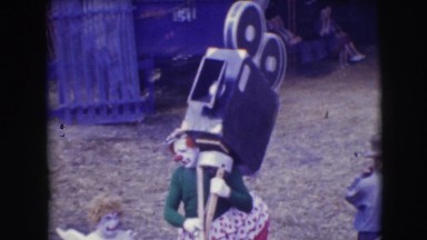 1948: a circus is being set up, people are seen bringing their props they need