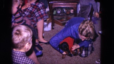 1964: Kids Putting a Sweater on the New Dog, Dancing and Playing