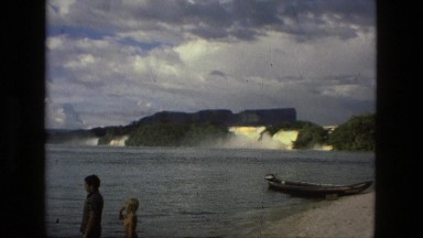 1979: People Relaxing on Water Bank and in Boats Brazil