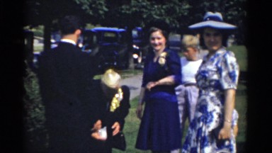 1943: people gather outdoors on sunny day for funeral BRIDGEPORT, CONNECTICUT