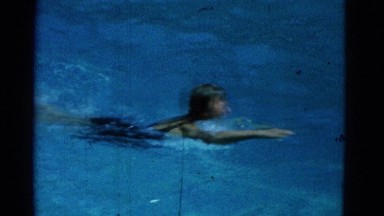 1953: man vs woman: victory lap in the pool COTTONWOOD, ARIZONA