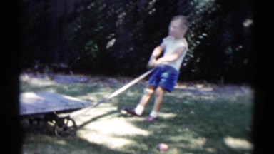 1959: a child is seen playing DISNEYLAND, CALIFORNIA