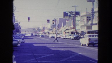 1962: a street with cars and people SAN PEDRO, CALIFORNIA