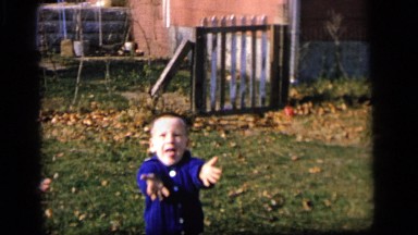 1964: small child fails to catch a ball. CAMDEN, NEW JERSEY