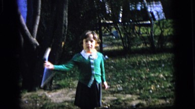 1964: majorette playing in the garden CAMDEN, NEW JERSEY