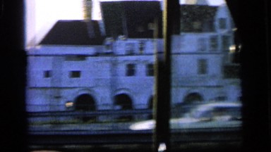 1964: Driving Past Large Buildings in Camden, New Jersey