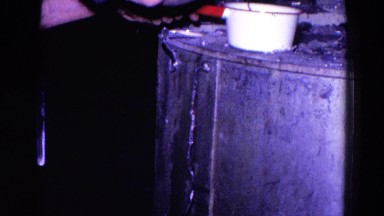 1967: man with cigar in his mouth stirring something in white pot PITTSBURGH,