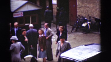 1948: a formal social gathering outside