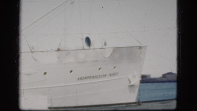1948: a ship sitting at the dock