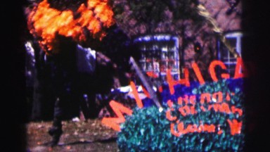 1968: displaying michigan pride on front lawn