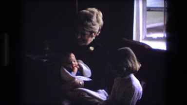 1973: Showing Off the New Baby to His Big Sister