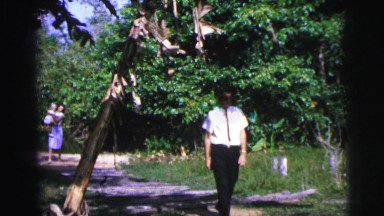 1979: strolling away, parents with kid in the park