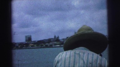 1979: man with a hat on the boat