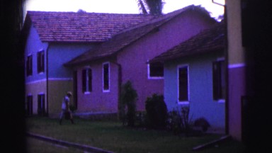 1979: Man Moving Toward House With Briefcase in Hand