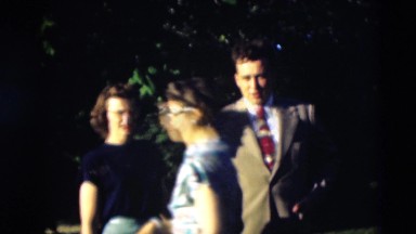 1951: a family seen with people posing for camera well suited up WILLMAR