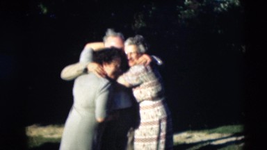 1951: a family is seen posing for a picture hugging each other WILLMAR, KENTUCKY