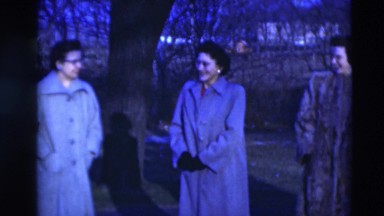 1951: people with long coats are seen talking and posing for the camera WILLMAR
